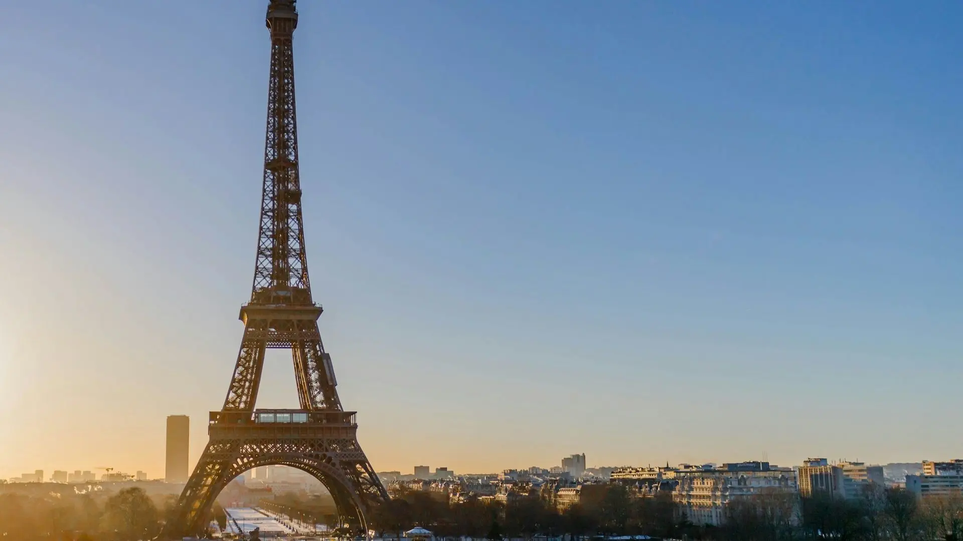 Eiffel Tower against a clear evening sky Eiffel Tower against a clear evening sky