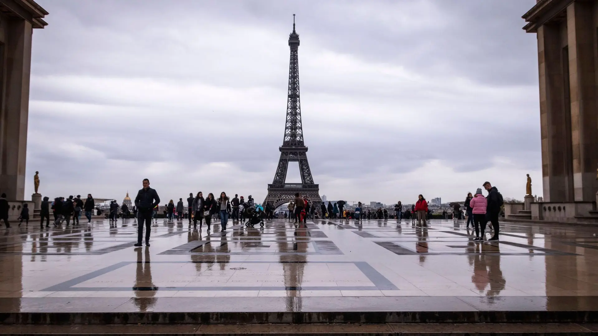 Visitors on the Trocadéro esplanade facing the Eiffel Tower Visitors on the Trocadéro esplanade facing the Eiffel Tower